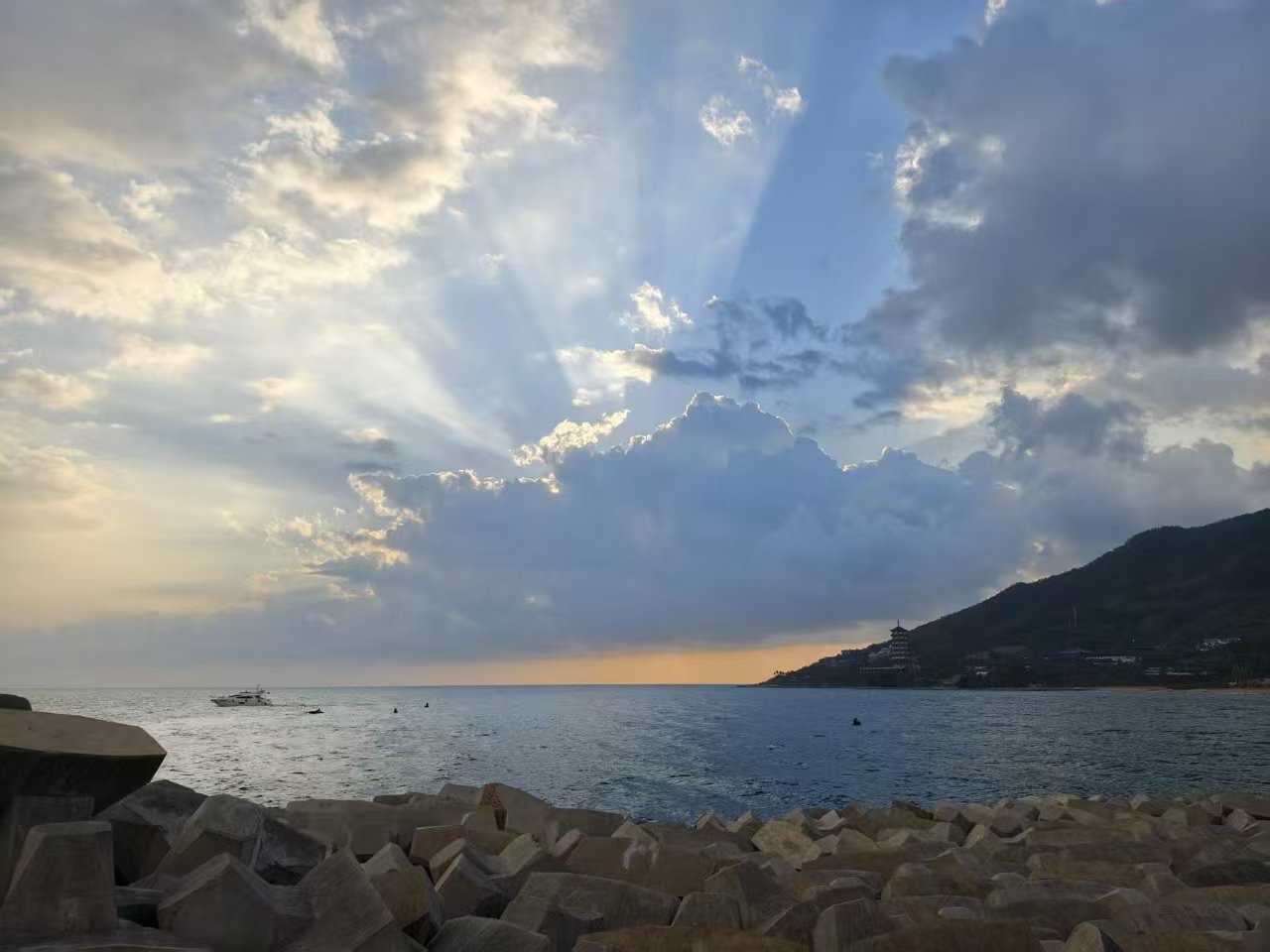 Sunlight breaking through clouds above the South China Sea in Sanya